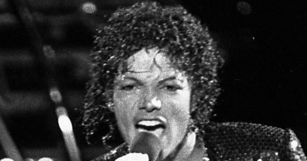 The Jacksons performing on stage at Arrowhead Stadium, Kansas City, during the Victory Tour