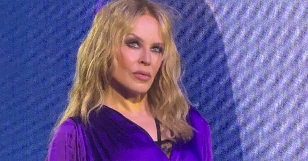 Image in QuizMyDay Identify Kylie Minogue's Songs Titles.  Take the Fan Quiz. trivia quiz featuring Photo of Kylie Minogue performing in Thailand