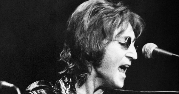 Image in QuizMyDay John Lennon Songs Quiz: Test Your Music Trivia Skills trivia quiz featuring Yoko Ono and John Lennon at John Sinclair Freedom Rally at Crisler Arena in Ann Arbor, Michigan