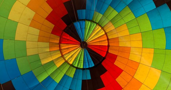 Image in QuizMyDay Know These Songs? Color Hits Knowledge Quiz trivia quiz featuring This shows the view directly above the basket of a hot air balloon while in flight.