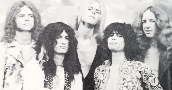 Image in QuizMyDay Aerosmith 70s Hits Knowledge Challenge Quiz Now trivia quiz featuring Trade ad for Aerosmith's single "Dream On"; photo taken in 1972 for Aerosmith's debut album.<br>To better adapt it to its respective Wikipedia article, the ad was cropped and cleaned in a graphics editing program. The original can be viewed at the source below.