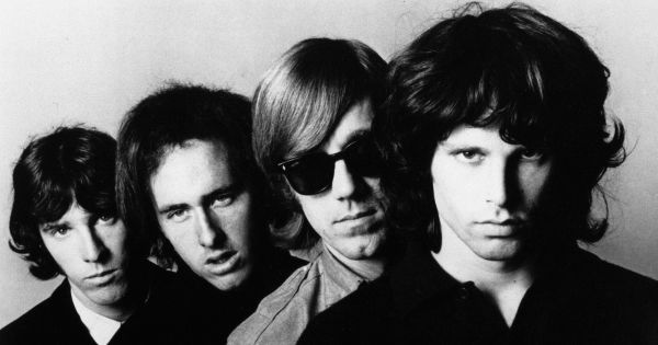 Image in QuizMyDay 60s Trivia Quiz: Identify the Song by the Band Name trivia quiz featuring Promotional photo of The Doors.