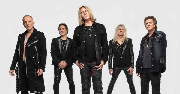 an image in QuizMyDay Def Leppard trivia quiz featuring a 2018 photo of the band members of Def Leppard