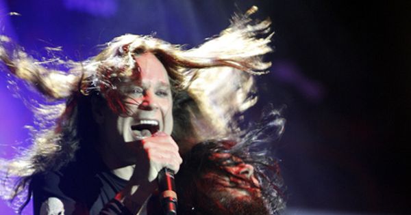 Image in QuizMyDay Bark at the Trivia: The Ultimate Ozzy Osbourne Quiz trivia quiz featuring Ozzy Osbourne performing live with his bassist Blasko.