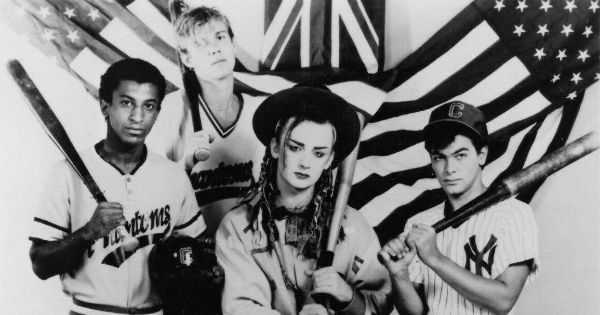 Image in QuizMyDay The Synth Strikes Back: 80s Music Quiz trivia quiz featuring Musical group Culture Club in a 1980s publicity photo.