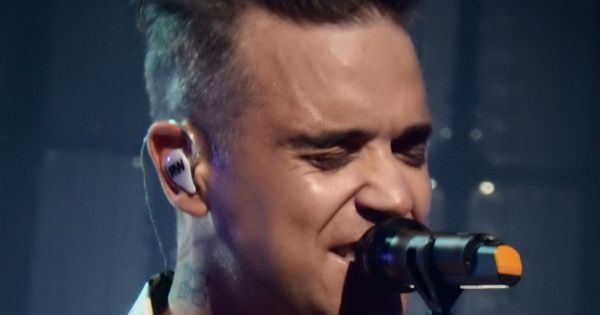 Image in QuizMyDay Top pick: Robbie Williams Songs & Albums Quiz — How Well Do You Know His Discography? trivia quiz featuring Robbie Williams, Roundhouse, London (Apple Music Festival)