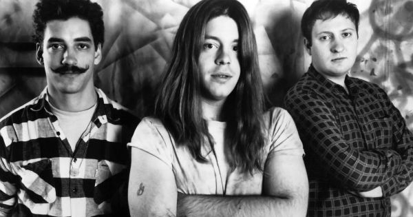 Image in QuizMyDay Hüsker Dü Quiz: Test Your Punk Rock History Skills trivia quiz featuring American rock band <a href="https://en.wikipedia.org/wiki/H%C3%BCsker_D%C3%BC" class="extiw" title="w:Hüsker Dü">Hüsker Dü</a> in a publicity photo promoting their fifth album and major label debut, <i><a href="https://en.wikipedia.org/wiki/Candy_Apple_Grey" class="extiw" title="w:Candy Apple Grey">Candy Apple Grey</a></i>, on <a href="https://en.wikipedia.org/wiki/Warner_Records" class="extiw" title="w:Warner Records">Warner Bros. Records</a>. Left to right: <a href="https://en.wikipedia.org/wiki/Greg_Norton" class="extiw" title="w:Greg Norton">Greg Norton</a>, <a href="https://en.wikipedia.org/wiki/Grant_Hart" class="extiw" title="w:Grant Hart">Grant Hart</a>, and <a href="https://en.wikipedia.org/wiki/Bob_Mould" class="extiw" title="w:Bob Mould">Bob Mould</a>.
