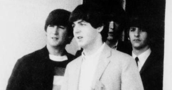 Image in QuizMyDay The Beatles' Rubber Soul Album Quiz: See if you can score 5/5 trivia quiz featuring The Beatles in front of their hotel in Key West, Florida