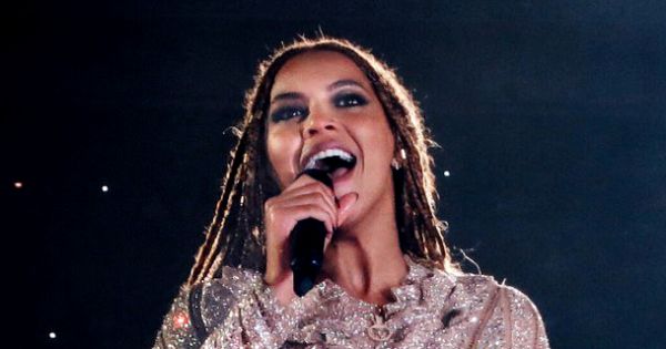 Image in QuizMyDay Can You Score 10/10? The Ultimate Pop Music Knowledge Test trivia quiz featuring A cropped version of the previously uploaded file "FWT11.jpg", which features Beyoncé performing during her Formation World Tour in London.