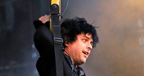 Image in QuizMyDay Green Day's 'Jesus of Suburbia' Song Facts Quiz trivia quiz featuring <a href="https://en.wikipedia.org/wiki/Billie_Joe_Armstrong" class="extiw" title="en:Billie Joe Armstrong">Billie Joe Armstrong</a>, singer and guitarist of <a href="https://en.wikipedia.org/wiki/Green_Day" class="extiw" title="en:Green Day">Green Day</a>, stands on the Center Stage of <a href="https://en.wikipedia.org/wiki/Rock_im_Park" class="extiw" title="en:Rock im Park">Rock im Park-Festival 2013</a>.
