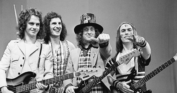 Image in QuizMyDay Slade Quiz: Test Your Knowledge of the Glam Rock Legends trivia quiz featuring Slade in AVRO's TopPop (Dutch television show) in 1973