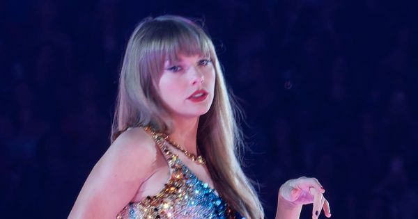 Image in QuizMyDay Taylor Swift 'Lover' Album Quiz: Test Your Music Memory trivia quiz featuring American singer-songwriter Taylor Swift on the Eras Tour in Arlington, Texas, April 2, 2023