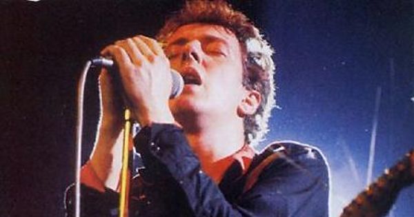 Image in QuizMyDay Joe Strummer Quiz: Test Your Clash Music Expertise trivia quiz featuring joe strummer singing