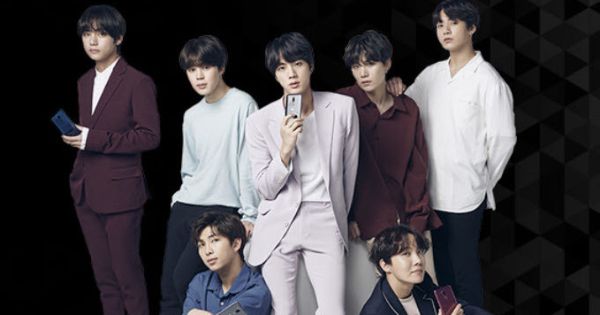 Image in QuizMyDay BTS Arirang Quiz: How Well Do You Know the 2026 Album? trivia quiz featuring A mobile advertisement of BTS for the LG G7 ThinQ cellphone