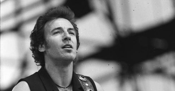 Image in QuizMyDay Born to Run: Take The Bruce Springsteen Song Quiz.  Can You Score 5/5? trivia quiz featuring <div class="description">
<div style="background:var(--background-color-neutral, #eaecf0); color:inherit; font-size:86%; direction:ltr;">For documentary purposes the German Federal Archive often retained the <b>original image captions</b>, which may be <b>erroneous, biased, obsolete or politically extreme</b>. <abbr class="BArchtooltips" title="Files from the inventories “Bild 101 Propagandakompanien der Wehrmacht” and “Bild 183 ADN” may have particularly biased or politically extreme descriptions."><span typeof="mw:File"><span><img src="https://upload.wikimedia.org/wikipedia/commons/thumb/5/53/Info_non-talk.svg/20px-Info_non-talk.svg.png" decoding="async" width="15" height="15" class="mw-file-element" srcset="https://upload.wikimedia.org/wikipedia/commons/thumb/5/53/Info_non-talk.svg/40px-Info_non-talk.svg.png 1.5x" data-file-width="62" data-file-height="62"></span></span></abbr></div><div class="language de">ADN-ZB/Uhlemann/19.7.88/Berlin: Springsteen Konzert/ Der US-amerikanische Sänger und Gitarrist Bruce Springsteen gab zur Eröffung des 5. Berliner Rocksommers ein Konzert auf der Radrennbahn in Weißensee</div></div>