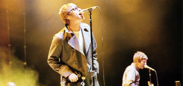 Image in QuizMyDay Oasis Quiz: 5 Quick Questions trivia quiz featuring Liam and Noel Gallagher of Oasis performing in San Diego on September 18, 2005.