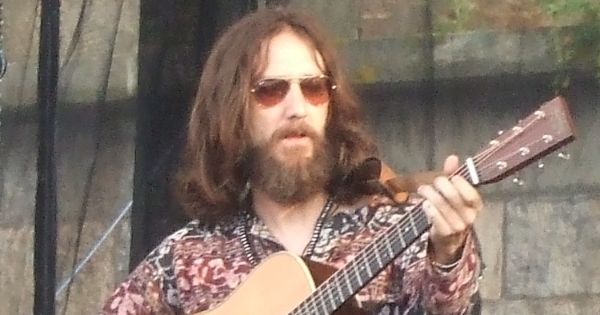 Image in QuizMyDay Black Crowes Trivia Quiz: Test Your Rock Knowledge trivia quiz featuring <a href="https://en.wikipedia.org/wiki/Chris_Robinson_(singer)" class="extiw" title="en:Chris Robinson (singer)">Chris Robinson</a> of the <a href="https://en.wikipedia.org/wiki/Black_Crowes" class="extiw" title="en:Black Crowes">en:Black Crowes</a> at the 2008 <a href="https://en.wikipedia.org/wiki/Newport_Folk_Festival" class="extiw" title="en:Newport Folk Festival">en:Newport Folk Festival</a>.