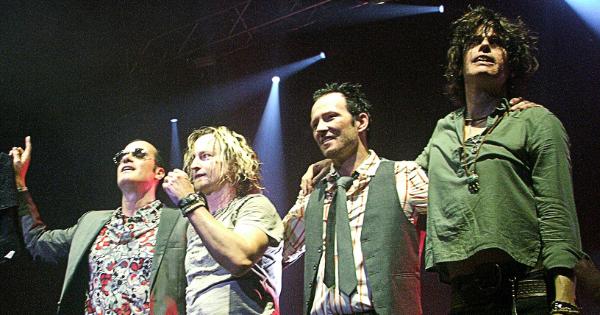 Image in QuizMyDay Stone Temple Pilots Knowledge: Take the Quiz! trivia quiz featuring Stone Temple Pilots lined up on stage.
