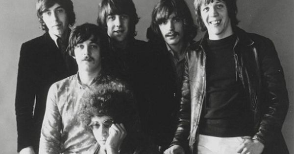 Image in QuizMyDay Procol Harum Quiz: Test Your Classic Rock Band Facts trivia quiz featuring Press photo of Procol Harum circa 1968. Sitting, from left: Gary Brooker, Keith Reid. Standing, from left: David Knights, B. J. Wilson, Matthew Fisher, Robin Trower. This photo depicts the group's "classic lineup" from 1967-69 which recorded their first three albums and the song "Homburg". In addition, this image included lyricist/songwriter Keith Reid, who did not regularly tour with the band nor was regularly photographed with them.