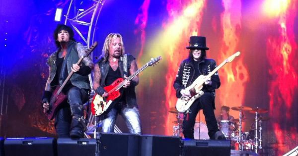 Image in QuizMyDay Motley Crue Trivia: 10-Question Challenge trivia quiz featuring Mötley Crüe in concert