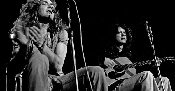 Image in QuizMyDay Led Zeppelin Quiz: 5 Questions to Test Your Rock Knowledge trivia quiz featuring Robert Plant and Jimmy Page from Led Zeppelin in Hamburg, Germany 1973 