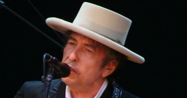 Image in QuizMyDay Bob Dylan Quiz: How Well Do You Know the Voice of a Generation? trivia quiz featuring Bob Dylan, onstage in Vitoria-Gasteiz, at the Azkena Rock Festival.