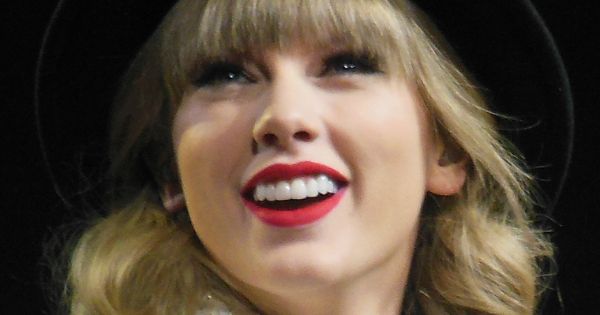 Image in QuizMyDay Taylor Swift Red Album Quiz: Test Your Music Trivia Skills trivia quiz featuring <a href="https://en.wikipedia.org/wiki/Taylor_Swift" class="extiw" title="en:Taylor Swift">Taylor Swift</a> performing <a href="https://en.wikipedia.org/wiki/Red_Tour" class="extiw" title="en:Red Tour">Red Tour</a> in St. Louis, Missouri, 25 March 2013.