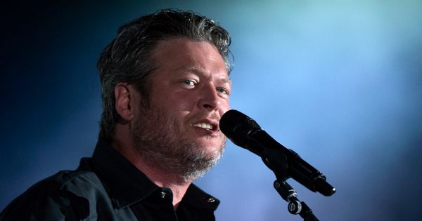 Image in QuizMyDay Shelton Showdown: Blake Shelton Quiz Challenge trivia quiz featuring Recording artist Blake Shelton performs during the 2017 Department of Defense Warrior Games opening ceremonies at Soldier Field in Chicago July 1, 2017. The DoD Warrior Games are an annual event allowing wounded, ill and injured service members and veterans to compete in Paralympic-style sports. (DoD photo by EJ Hersom)