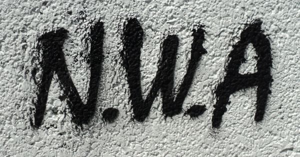 Image in QuizMyDay Straight Outta Compton - N.W.A Knowledge Trivia Quiz trivia quiz featuring Graffiti on wall: N.W.A. logo