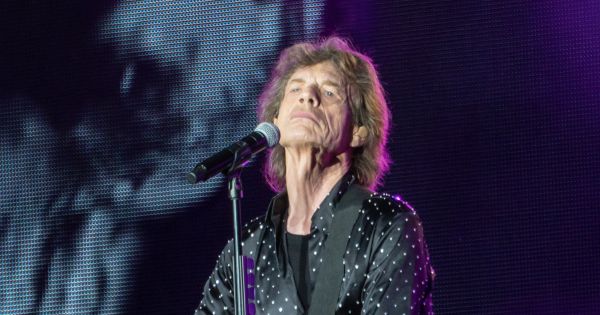 Image in QuizMyDay Rock Your Brain: The Ultimate Rolling Stones Song Quiz trivia quiz featuring Mick Jagger playing guitar onstage during a Rolling Stones concert in London on 22 May 2018.