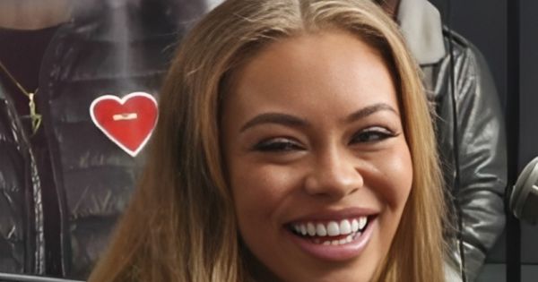 Image in QuizMyDay Big Energy Brain Test: The Ultimate Latto Quiz trivia quiz featuring Latto during an interview in 2023