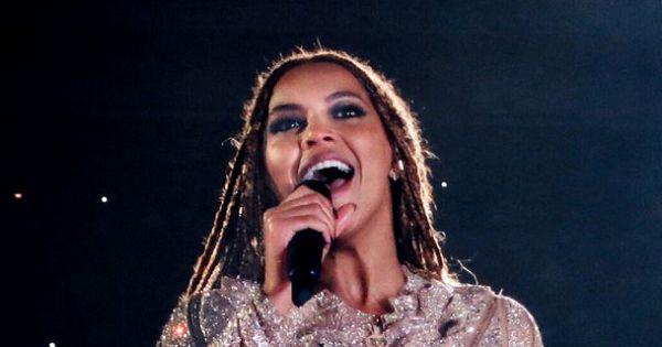 Image in QuizMyDay Beyoncé Quiz: Test Your Music and Career Facts trivia quiz featuring A cropped version of the previously uploaded file "FWT11.jpg", which features Beyoncé performing during her Formation World Tour in London.