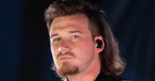 Image in QuizMyDay Ultimate Morgan Wallen Trivia: Test Your Knowledge trivia quiz featuring Morgan Wallen, an American country music artist performs his hit single “Whiskey Glasses” during Freedom Fest, June 28, 2019, at the Iron Horse Park, Fort Carson, Colorado.