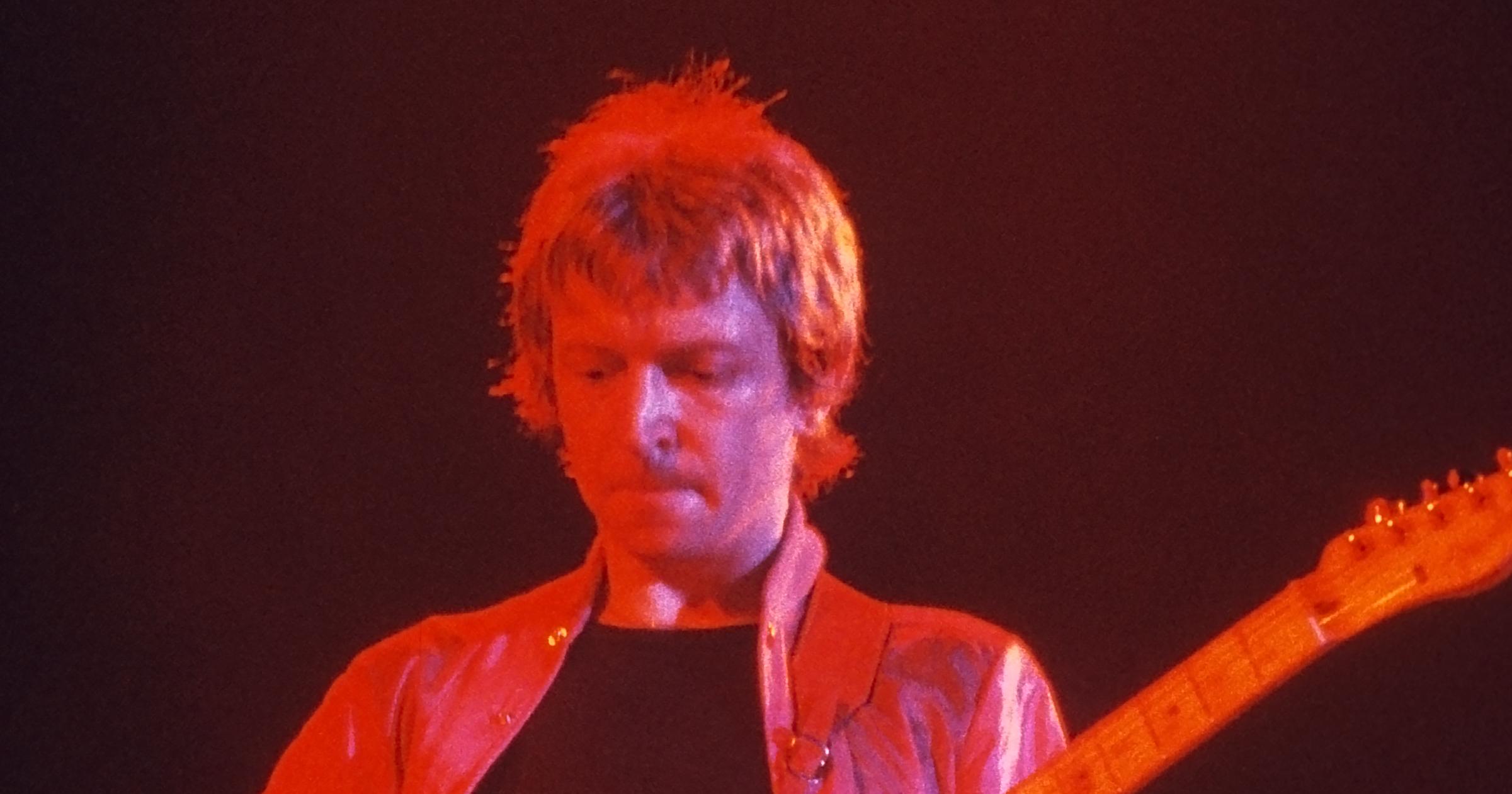 Image in QuizMyDay Police Synchronicity Knowledge Quiz: Test Your Skills trivia quiz featuring <a href="https://en.wikipedia.org/wiki/Andy_Summers" class="extiw" title="en:Andy Summers">Andy Summers</a> at <a href="https://en.wikipedia.org/wiki/The_Police" class="extiw" title="en:The Police">the Police</a> concert, Agora Ballroom, Atlanta, Georgia in 1979. Scanned Ektachrome slide.
