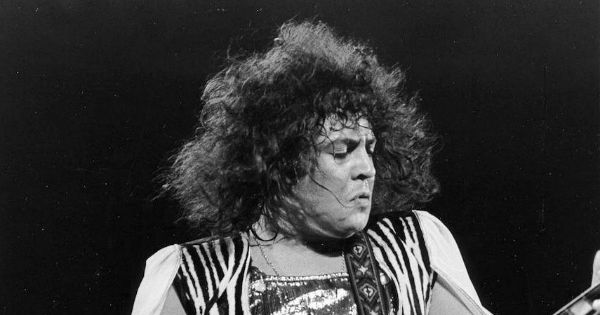 Image in QuizMyDay Bang a Gong: The Ultimate T. Rex Fan Quiz trivia quiz featuring Photo of Marc Bolan (T Rex) from a 1973 ABC Television <i>In Concert</i> performance.