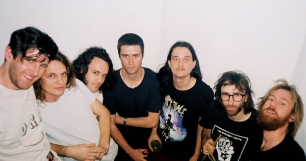 Image in QuizMyDay Gizzard Quiz: Test Your King Gizzard Knowledge trivia quiz featuring Photo of King Gizzard &amp; The Lizard Wizard in 2017. This photo was included as part of the free, public domain release of their 2017 album Polygondwanaland.