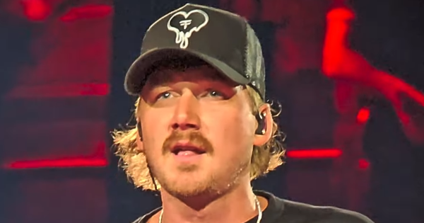 Image in QuizMyDay Ultimate Morgan Wallen Songs Quiz: Can You Score 5/5? trivia quiz featuring Morgan Wallen performing You Proof at Bank of America Stadium