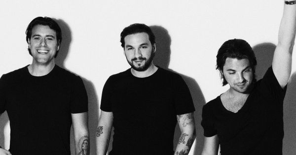 Image in QuizMyDay Swedish House Mafia Fan Quiz: Test Your Beat Skills trivia quiz featuring Electronic dance music supergroup <a href="https://en.wikipedia.org/wiki/Swedish_House_Mafia" class="extiw" title="en:Swedish House Mafia">Swedish House Mafia</a>. From left to right: Sebastian Ingrosso, Steve Angello and Axwell.