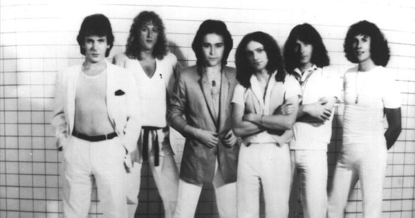 Image in QuizMyDay Foreigner Hits & History Knowledge Quiz trivia quiz featuring Musical group Foreigner in a 1979 publicity photo for their album <i>Head Games</i>. Pictured left to right; Ian MacDonald, Rick Wills, Mick Jones, Lou Gramm, Al Greenwood, and Dennis Elliot.
