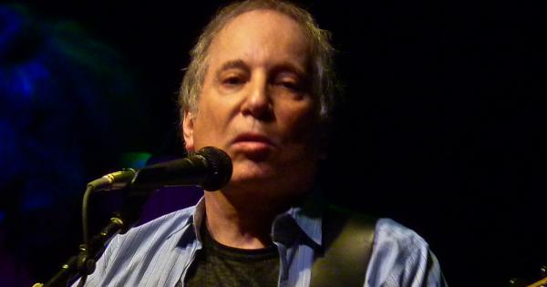 Image in QuizMyDay Paul Simon Solo: Hits, Albums & Career Deep Dive trivia quiz featuring Paul Simon playing at the <a href="https://en.wikipedia.org/wiki/9:30_Club" class="extiw" title="en:9:30 Club">9:30 Club</a> in Washington, D.C.