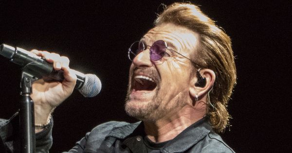 Image in QuizMyDay Bono Facts: Take the Bono Expert Trivia Quiz! trivia quiz featuring Bono singing during U2's performance at Lucas Oil Stadium in Indianapolis, Indiana on September 10, 2017