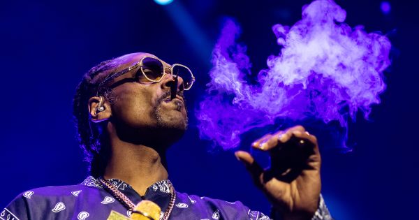 Image in QuizMyDay Snoop Dogg Songs Mastery Quiz: Test Your Knowledge trivia quiz featuring Snoop Dogg performing at the Qudos Bank Arena, Sydney.