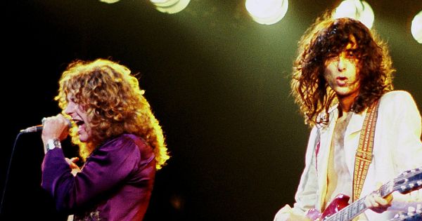 Image in QuizMyDay Led Zeppelin Quotes Quiz: Who Said It — Plant or Page? trivia quiz featuring Robert Plant (left) and Jimmy Page (right) of Led Zeppelin, in concert in Chicago, Illinois