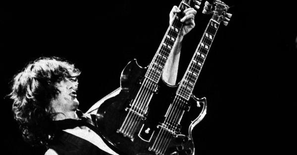 Image in QuizMyDay Led Zeppelin Quotes Quiz: Who Said It — Plant or Page? trivia quiz featuring Jimmy Page during the final solo of Stairway to Heaven