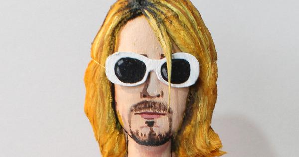 Image in QuizMyDay Nirvana Music Video Trivia — Guess the Iconic Videos trivia quiz featuring a Kurt Cobain doll