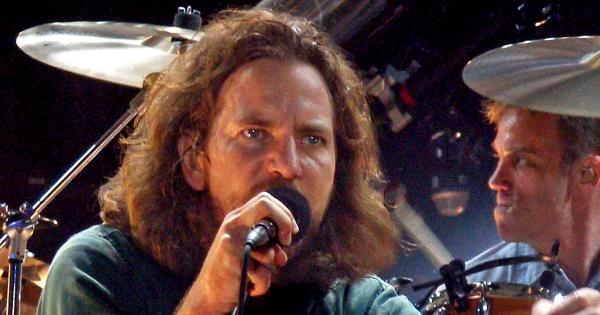 Image in QuizMyDay How Well Do You Know Pearl Jam? Ultimate Quiz Today trivia quiz featuring Eddie Vedder onstage with Pearl Jam, Albany, 2006.