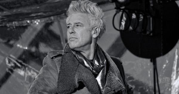 Image in QuizMyDay free quiz featuring Bass guitarist Adam Clayton performing with U2 at World AIDS Day Concert on 1 December 2014 in Times Square in New York City, NY