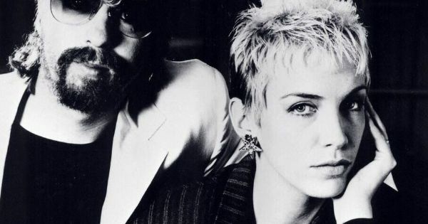Image in QuizMyDay Eurythmics Mastery Quiz: Test Your Annie Lennox & Dave Stewart 80s Knowledge trivia quiz featuring the Musical Duo Eurythmics: Dave Stewart  and Annie Lennox in 1985.
