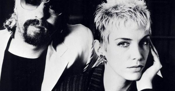 Image in QuizMyDay Eurythmics Mastery Quiz: Test Your Annie Lennox & Dave Stewart 80s Knowledge trivia quiz featuring the Musical Duo Eurythmics: Dave Stewart  and Annie Lennox in 1985.