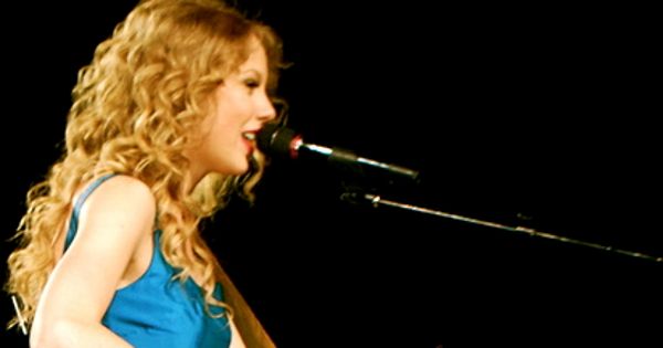 Image in QuizMyDay Taylor Swift Fearless Era Quiz: Test Your Album Trivia Skills trivia quiz featuring Taylor Swift performing at the Prudential Centre in May 2010 as part of the Fearless tour